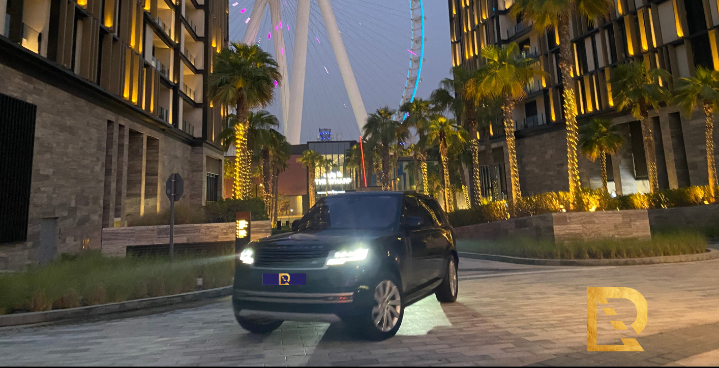 image of a green car driving Bluewater island for restex website home picture