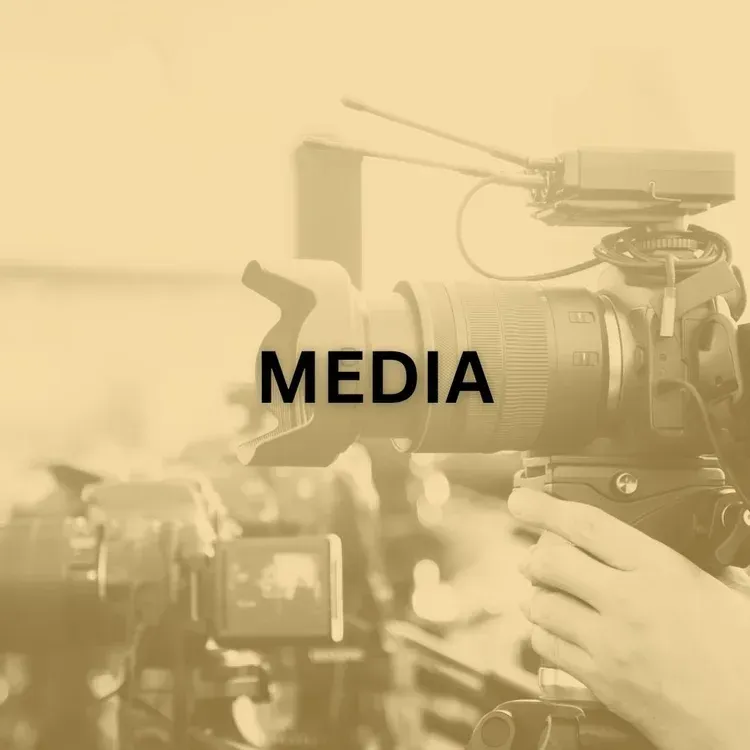 A professional video camera filming an event. 