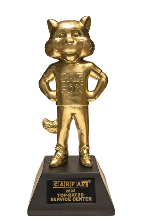 Golden Carfax Fox trophy on black base, 2023 Top-Rated Service Center.