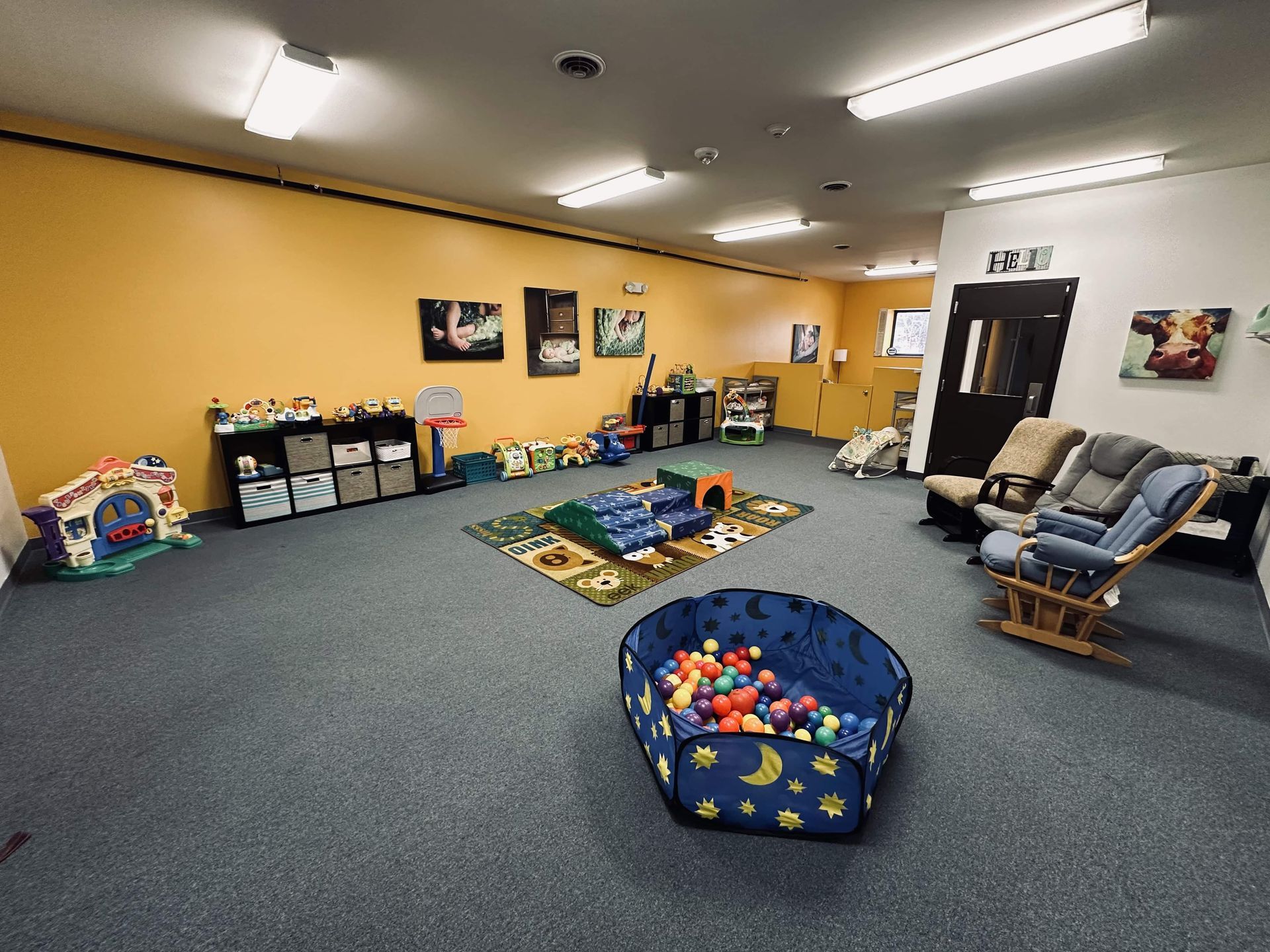 There is a ball pit in the middle of the room.