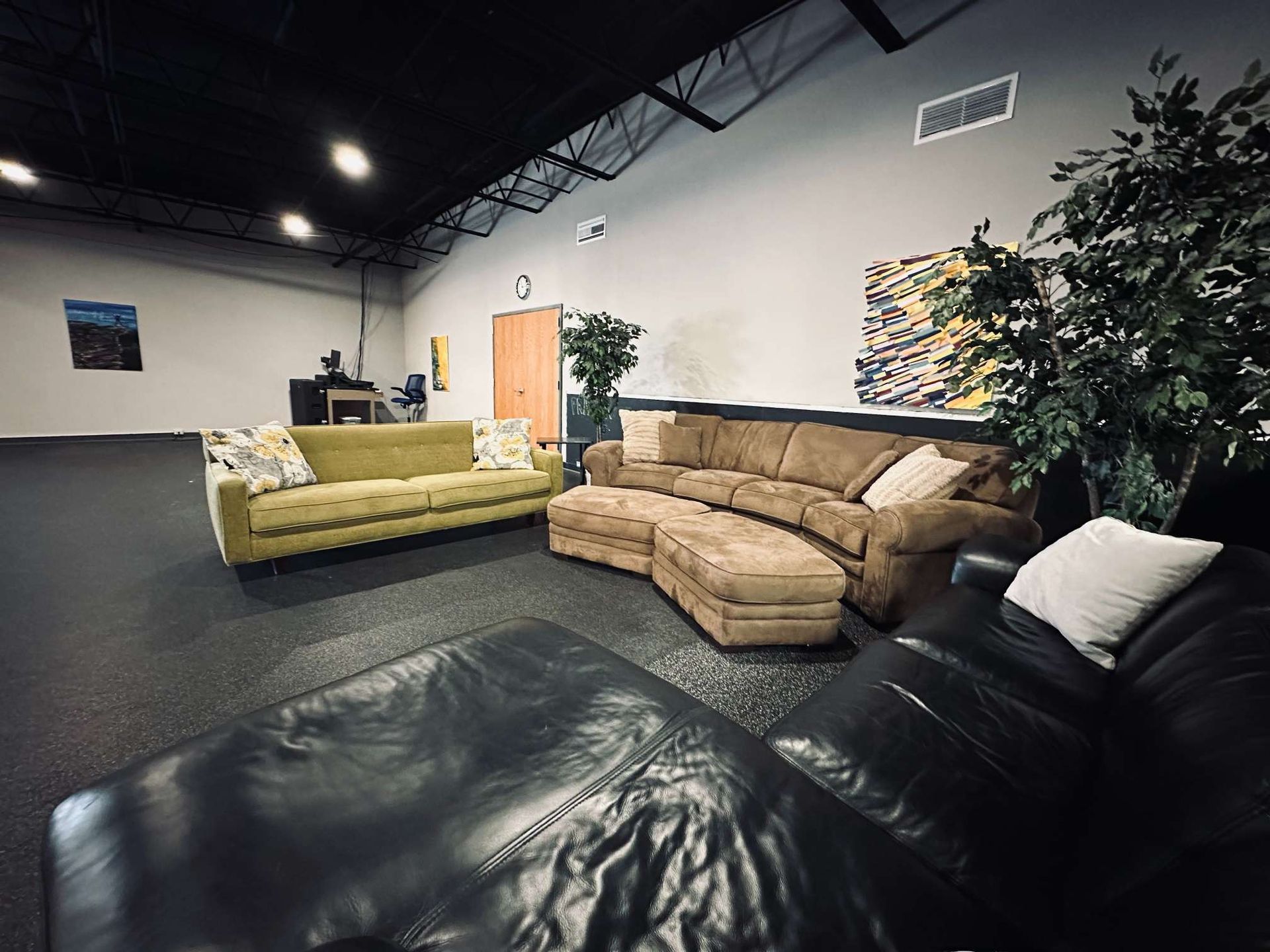 A living room filled with furniture and a couch.