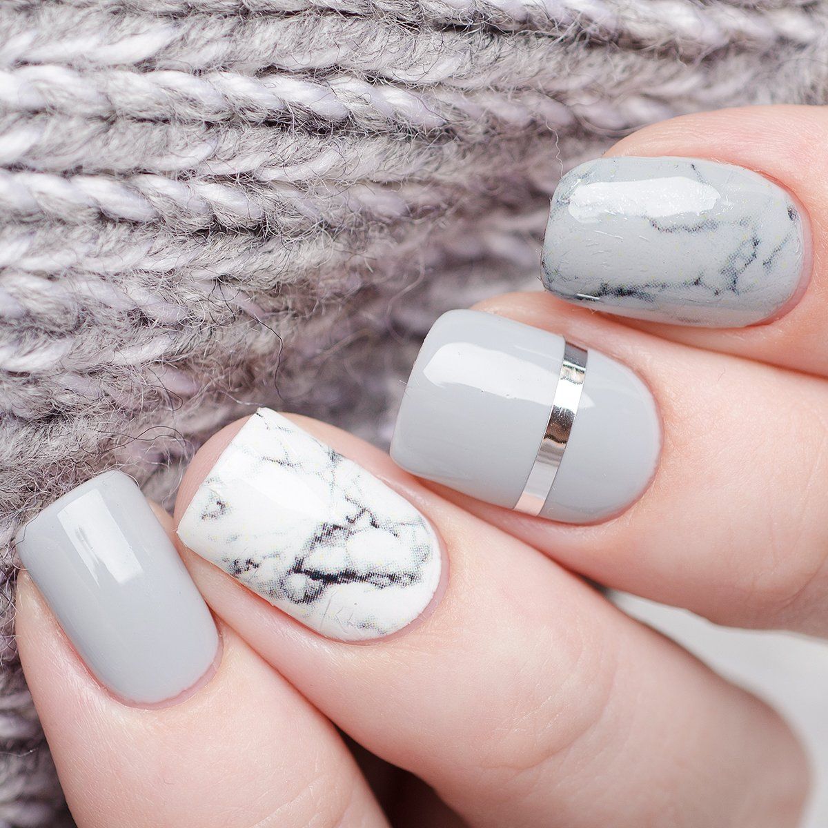 Grey design gel nails with stripe and marble effect from Beautiful beauticians