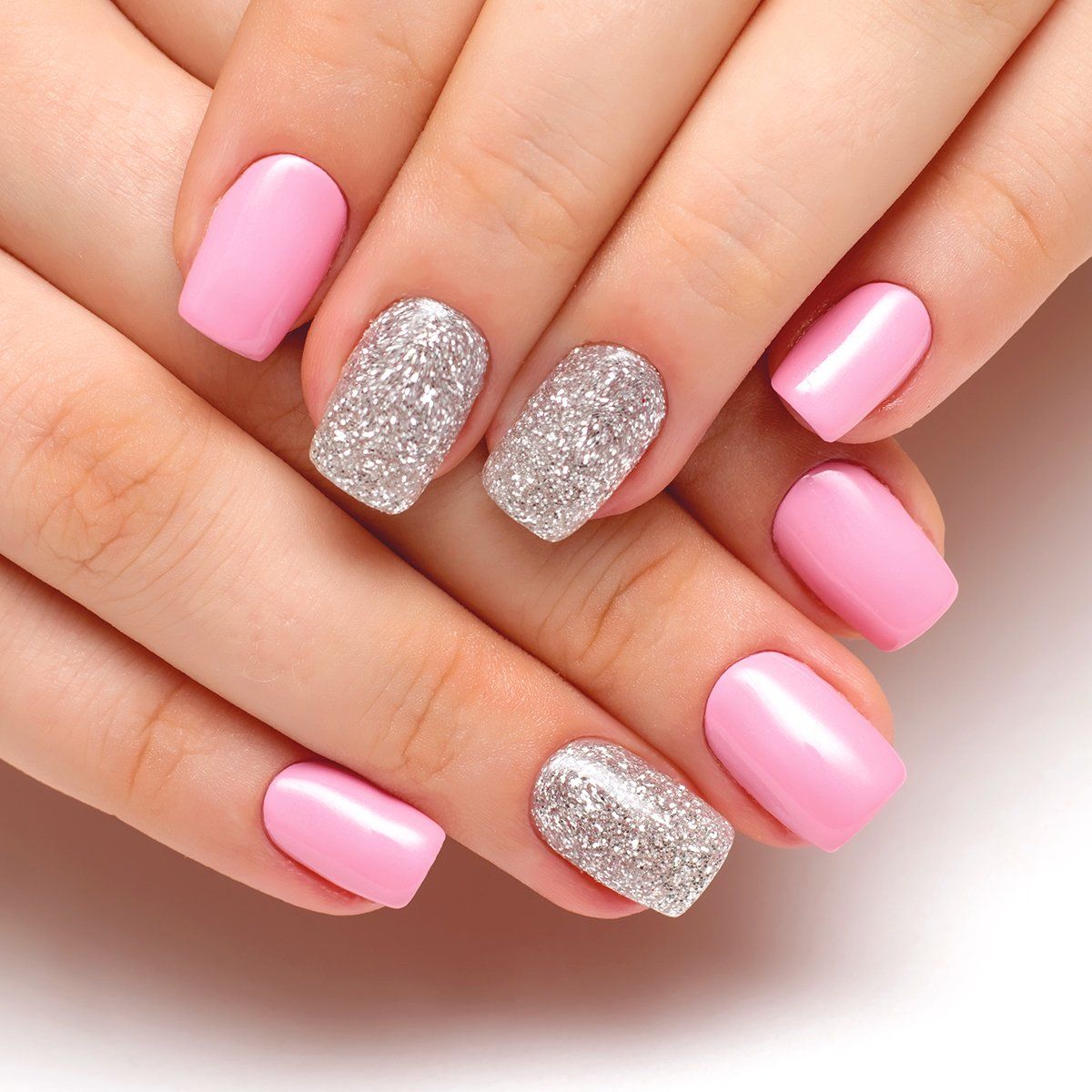 Beautiful pink with silver glitter feature nails from Beautiful home salon