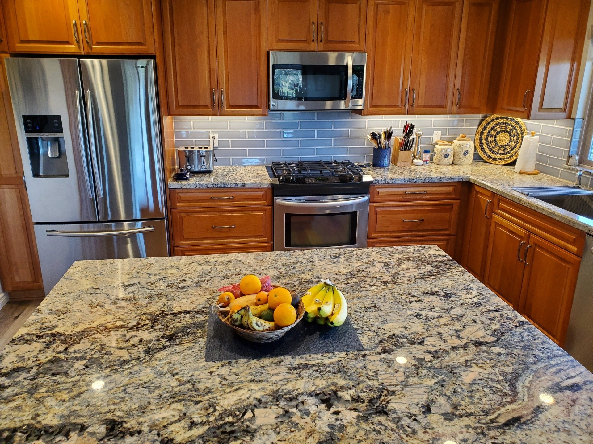 Porcelain Countertops — Kitchen with Marble Countertops in San Marcos, CA