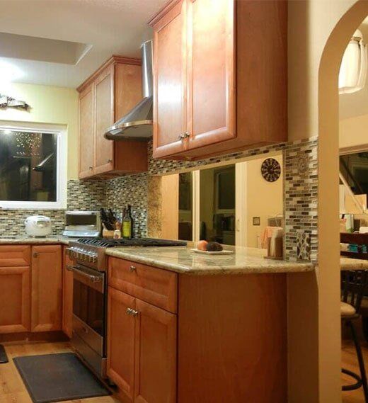 Stone Depot — Kitchen with Wooden Cabinets in San Marcos, CA