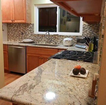 Granite Slabs — Kitchen with Marble Countertops in San Marcos, CA