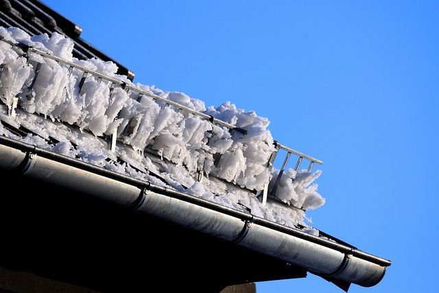 Ice on roof that is caught in an ice guard preventing an accident in Anchorage Alaska. 