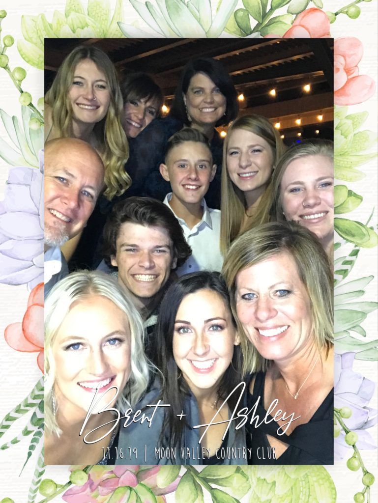 A group of people are posing for a picture together.