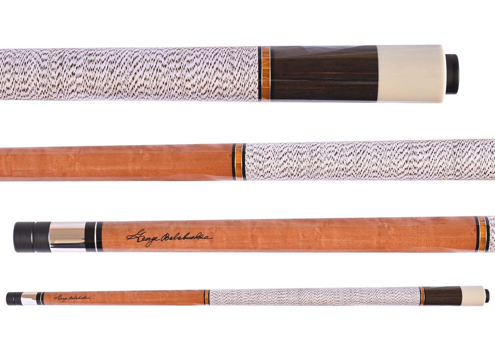 Four pool cues, each with different patterns: a white-patterned handle, wooden shaft, and black and white accents.