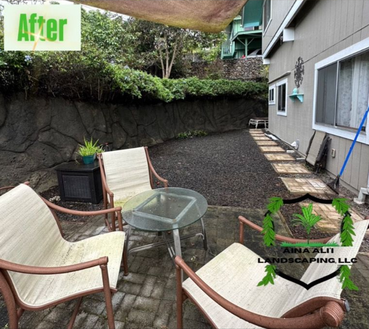 A patio with a table and chairs, a gravel area, and a stone wall next to a house, labeled as a landscaping after-shot.