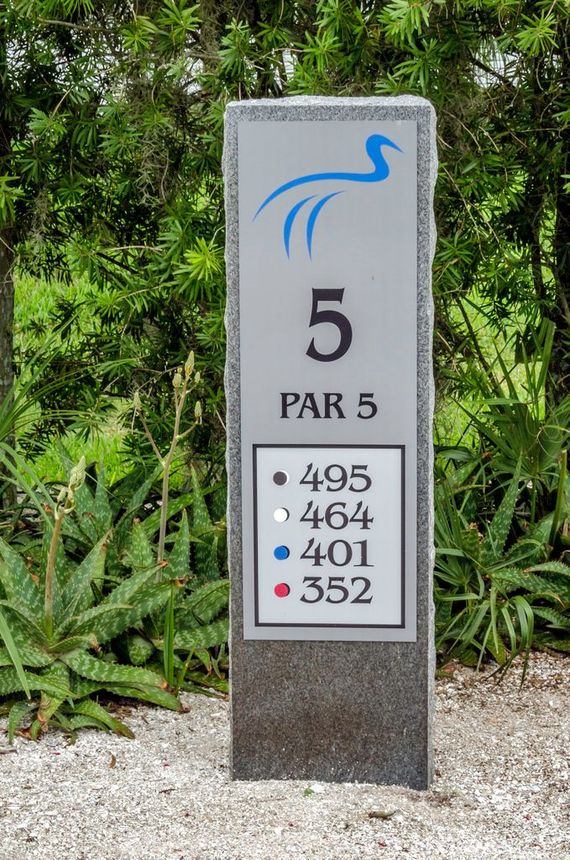 Golf course hole sign: Silver with blue bird logo, 
