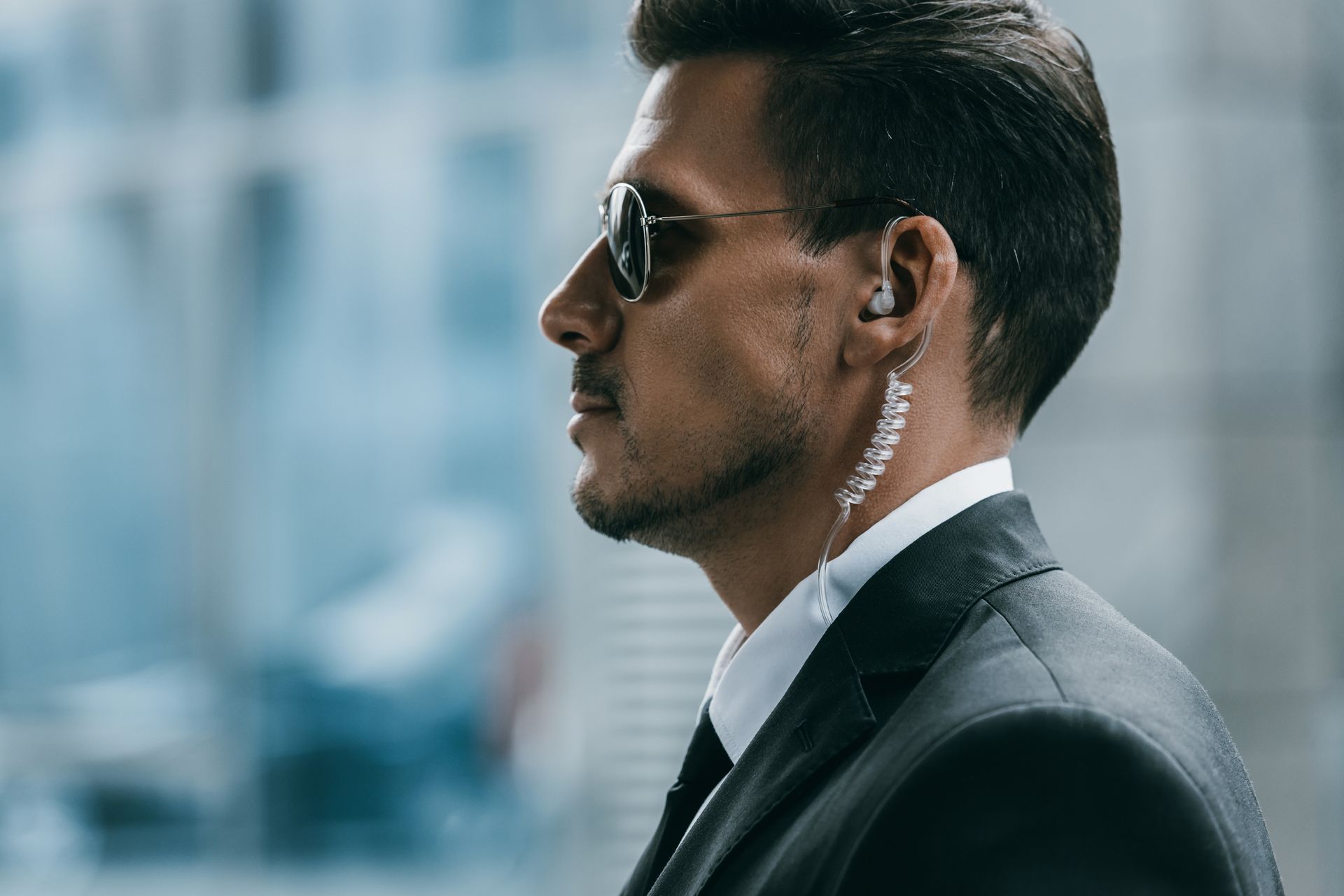 Man in suit and sunglasses