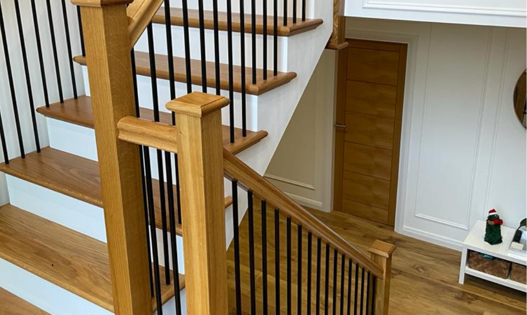 Lamp black bespoke cut string staircase