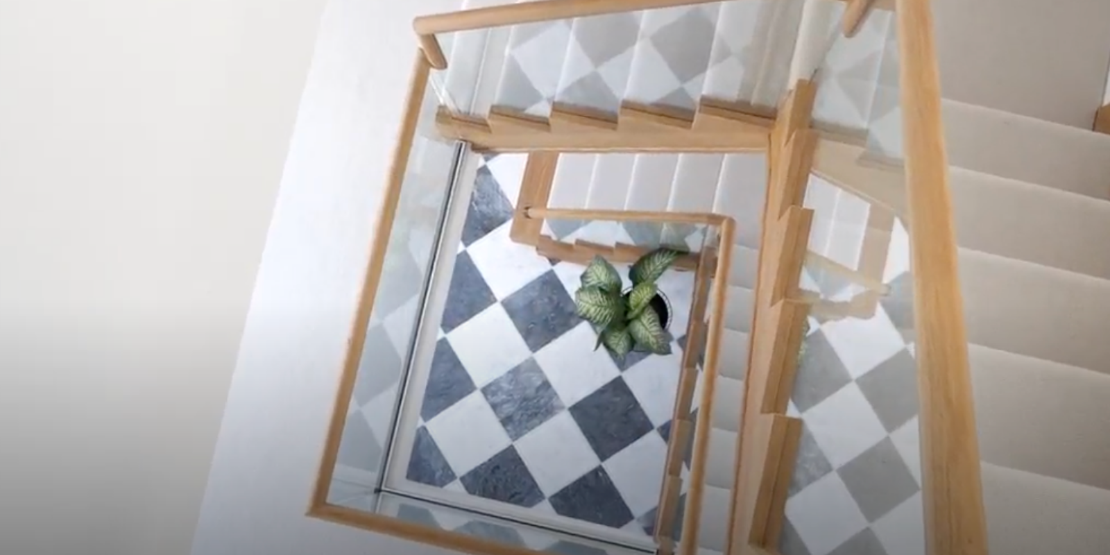 Bespoke glass balustrade, oak cut string staircase