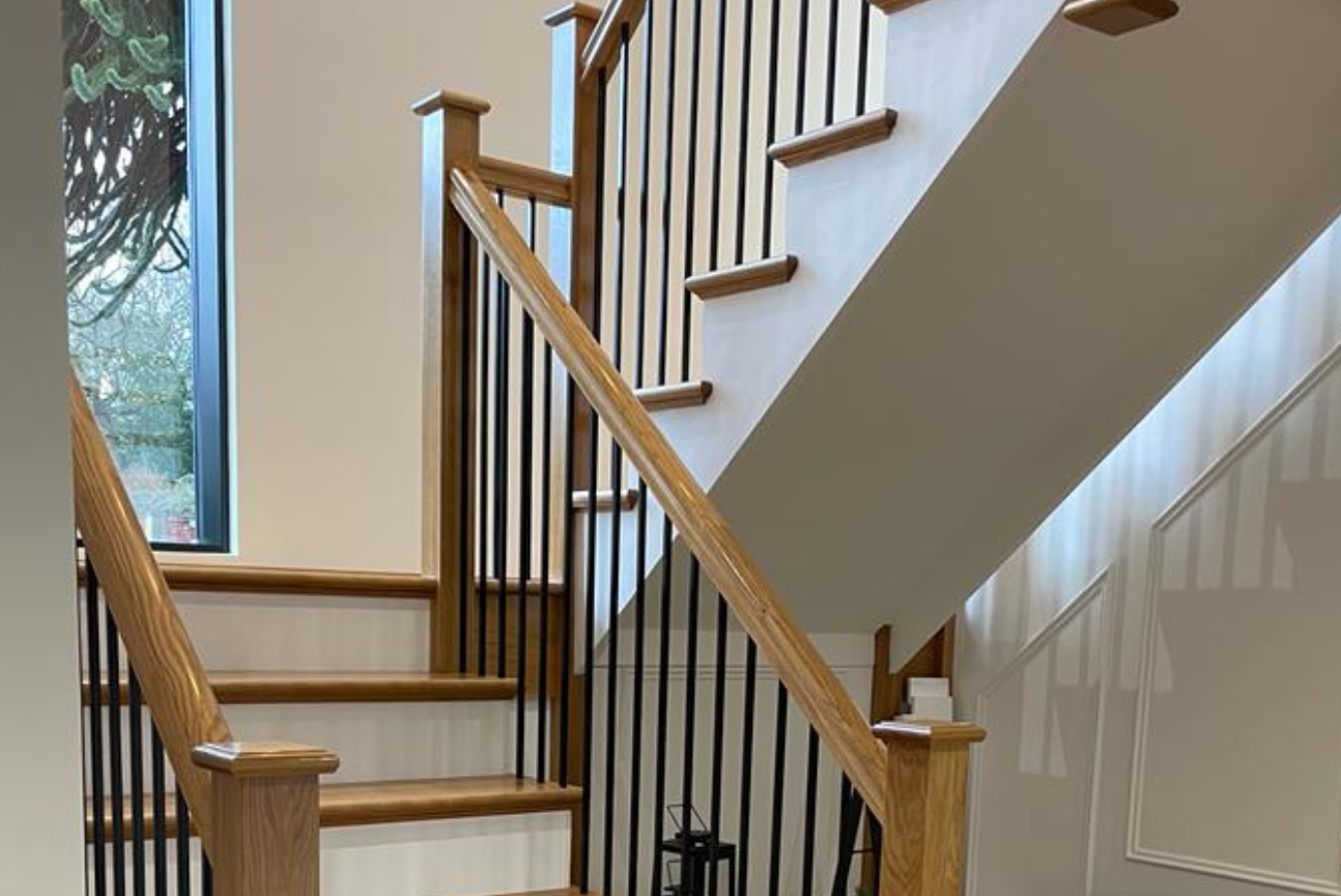 Lamp black bespoke cut string staircase