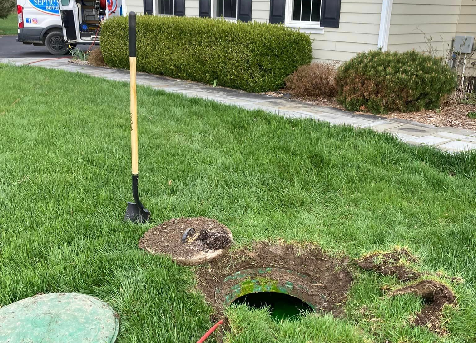 open manhole for septic tank cleaning in Elmira, NY