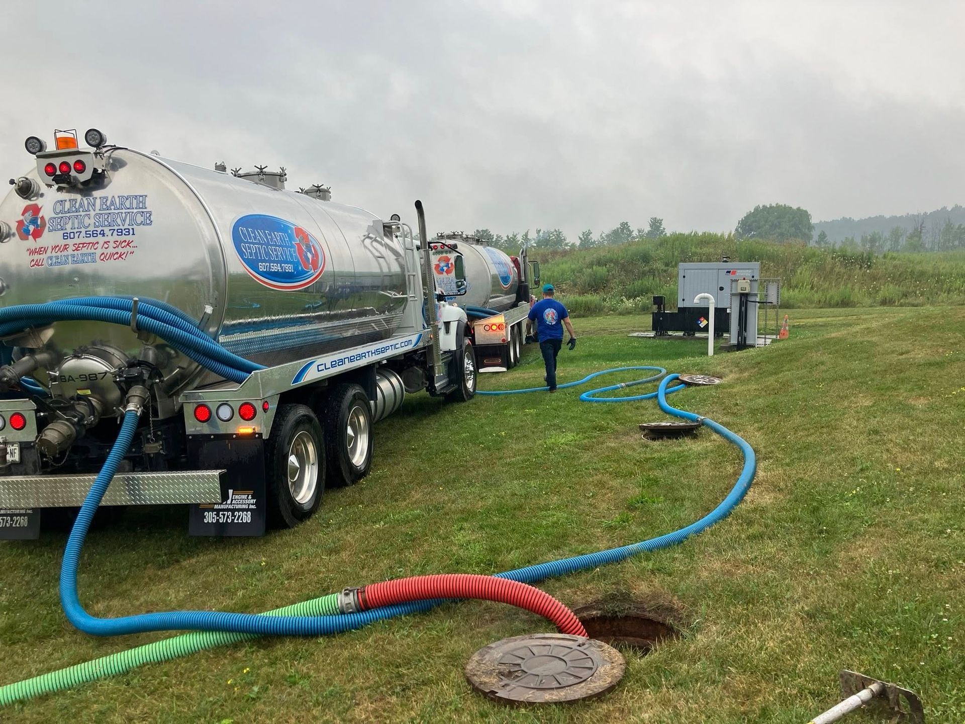 Clean Earth Septic trucks pumping out residential septic tanks in Ithaca, NY