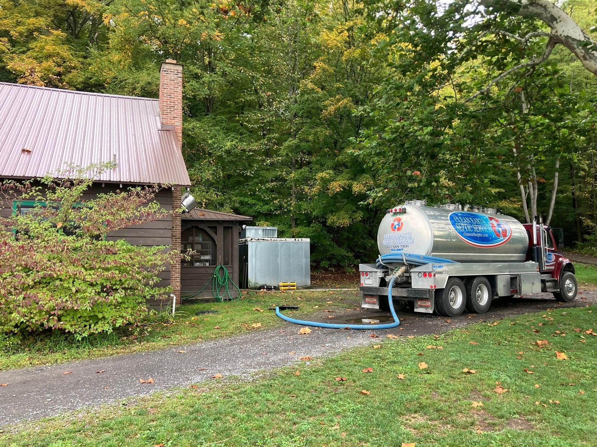 Clean Earth Septic Services Pump Truck emptying septic tank in Elmira, NY area