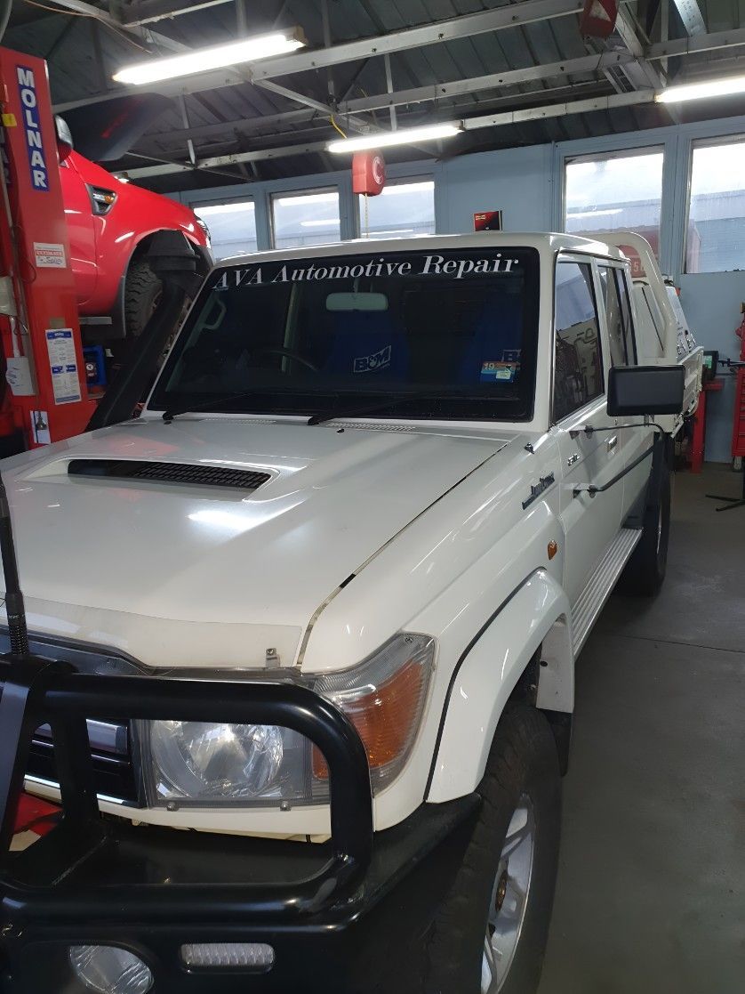 A White Truck With the Word Repair on the Windshield — AVA Automotive Repairs in Oak Flats, NSW