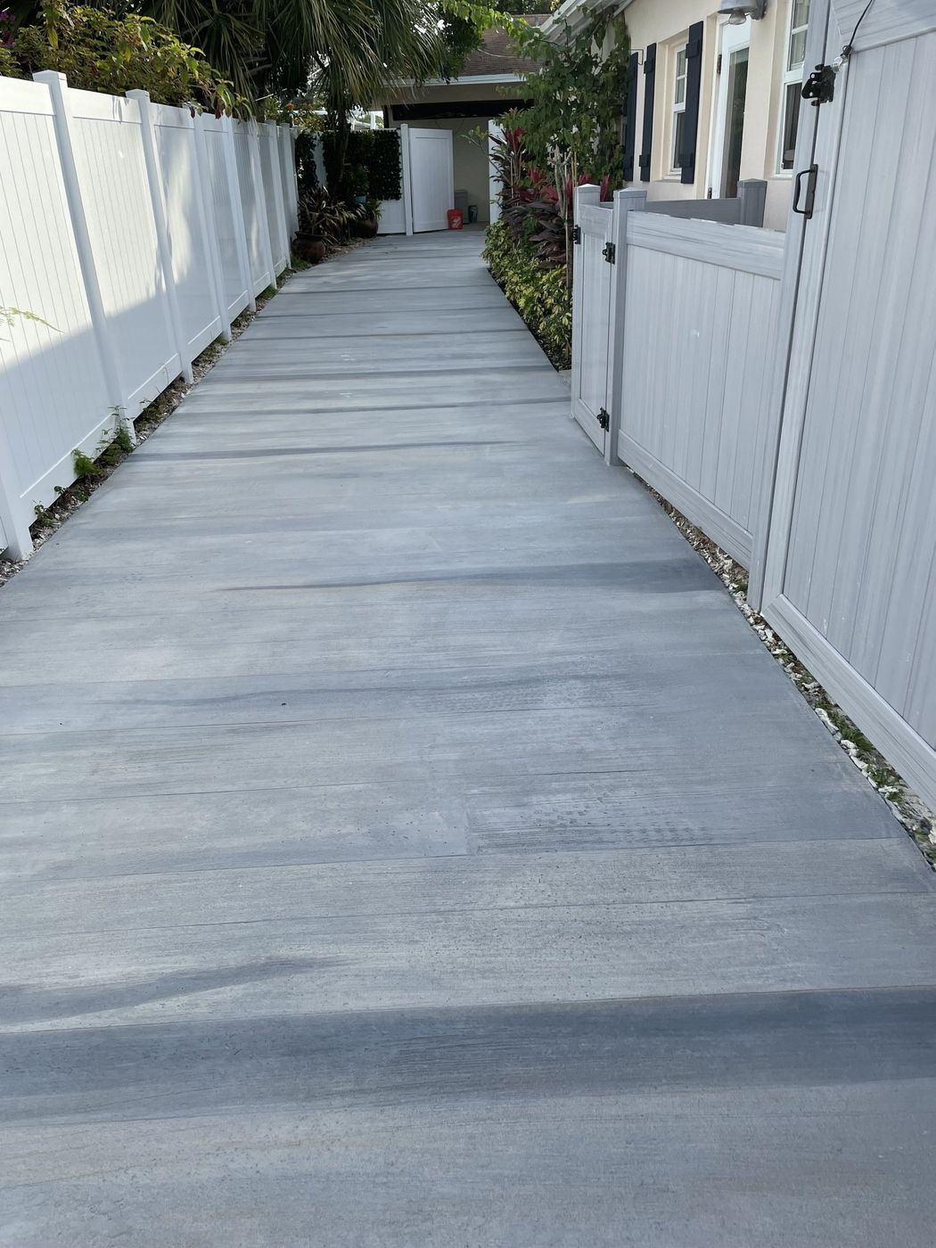 Decorative concrete overlay covering damaged floors by epoxy flooring companies near me in Fort Myers FL.