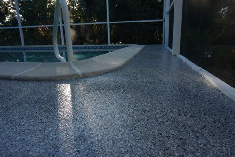 Slip-resistant pool deck epoxy coating in Naples FL – UV-protected, durable surface for safe and elegant outdoor living.