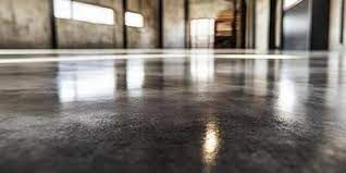 A seamless and decorative metallic epoxy floor in a modern living room.