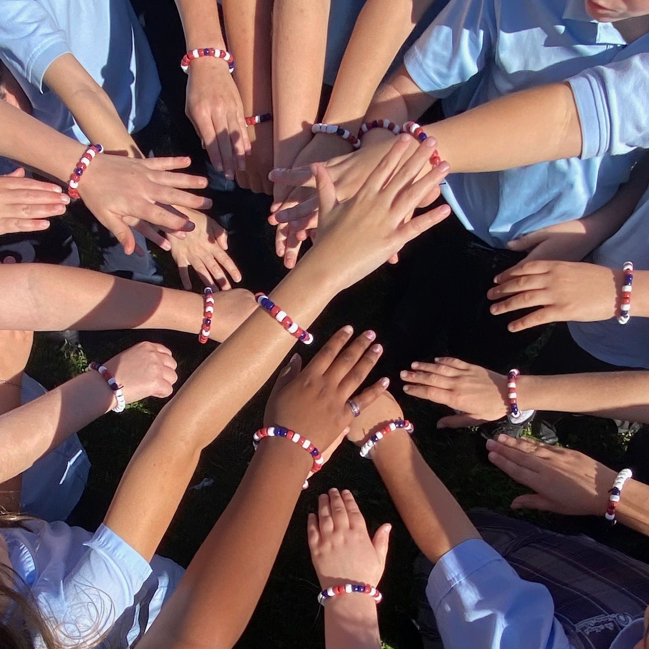 students wearing bracelets