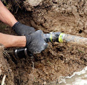Septic Tank Cleaning — Repairing a Broken Pipe in DeLand, FL