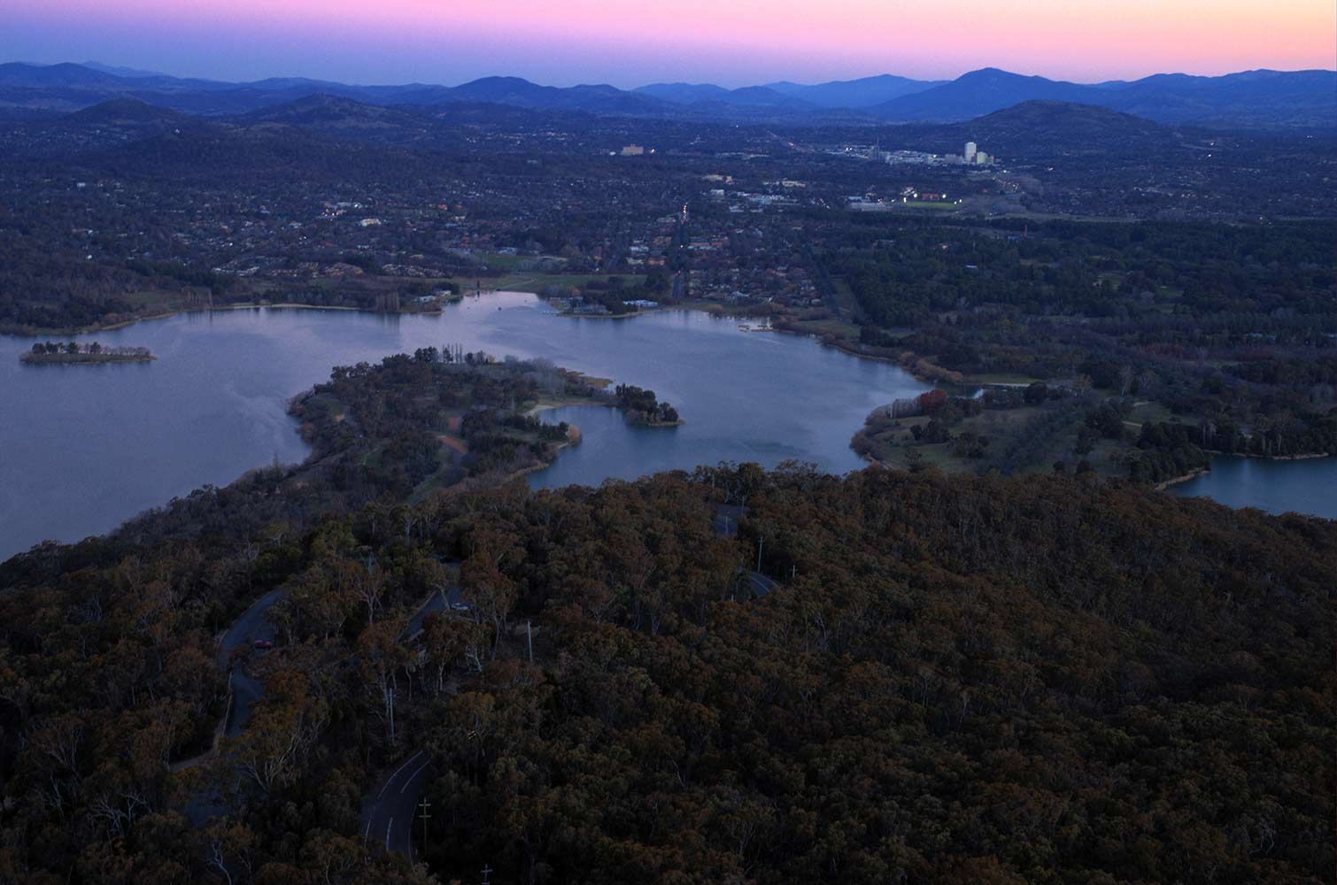 Lakes and Forested Hills at Dusk, With a City in the Background — CLF Landscapes in Woden, ACT