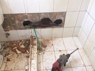 Repairing leak in Bathroom