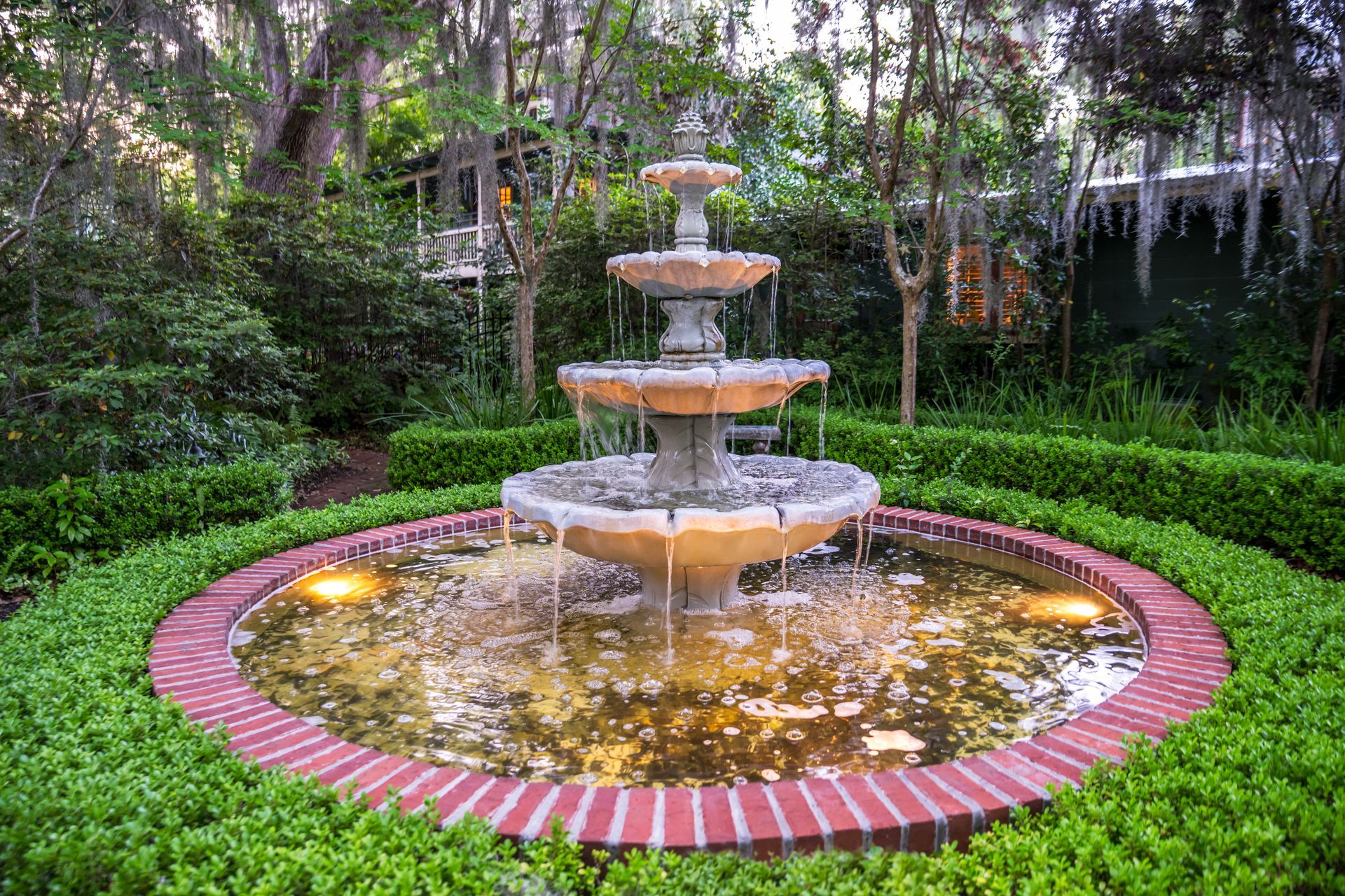 beautiful outdoor fountain with lights on