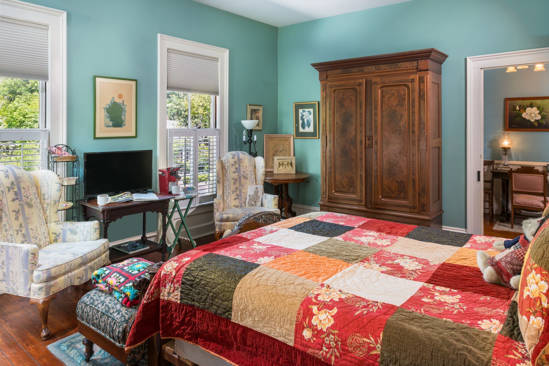 there is a large bed in the middle of the room