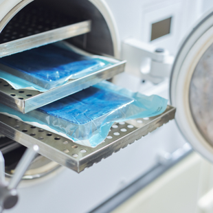 close up of sterilised instruments on autoclave tray