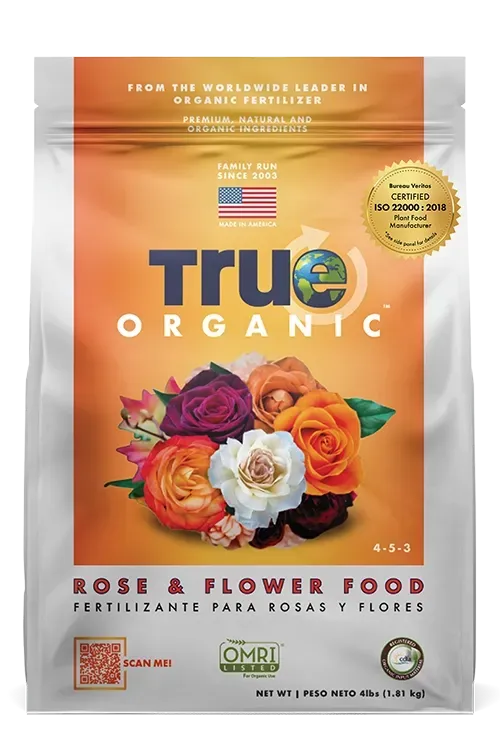 Bag of TruOrganic bone meal fertilizer with a floral and fruit design.