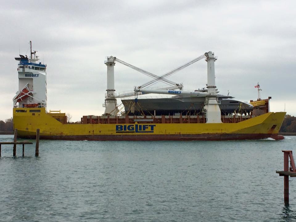 A large yellow ship with the word biglift on the side