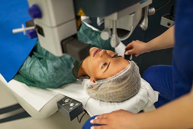 Woman having lasik eye surgery