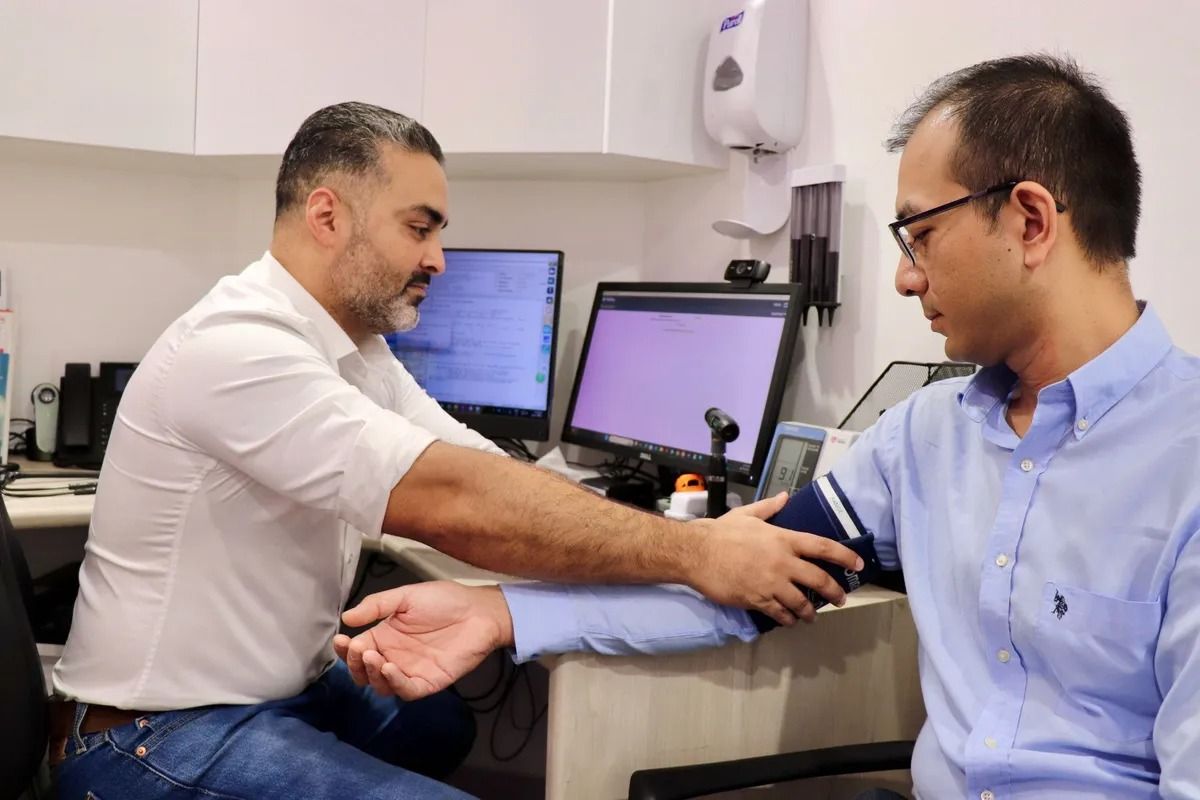 Doctor Checking a Patient's Blood Pressure