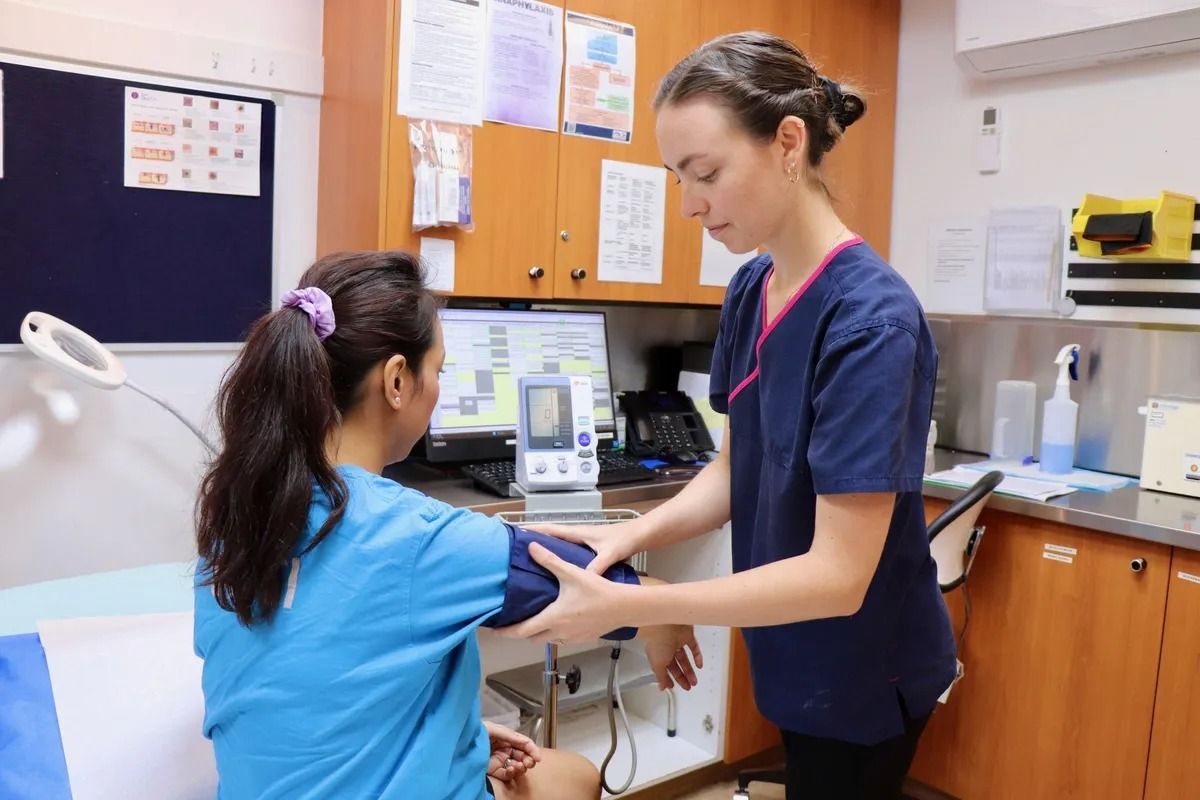 Nurse Taking Patient's Blood Pressure