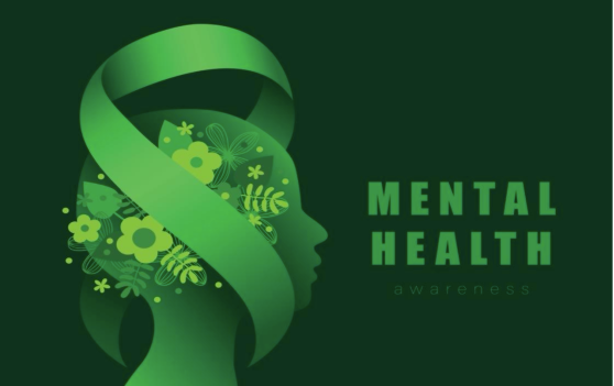 A green ribbon is wrapped around a woman 's head for mental health awareness.