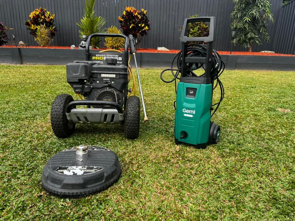 Two Pressure Washers and a Surface Cleaner on Grass — Mow & Mulch Lawn & Garden Maintenance In White Rock, QLD