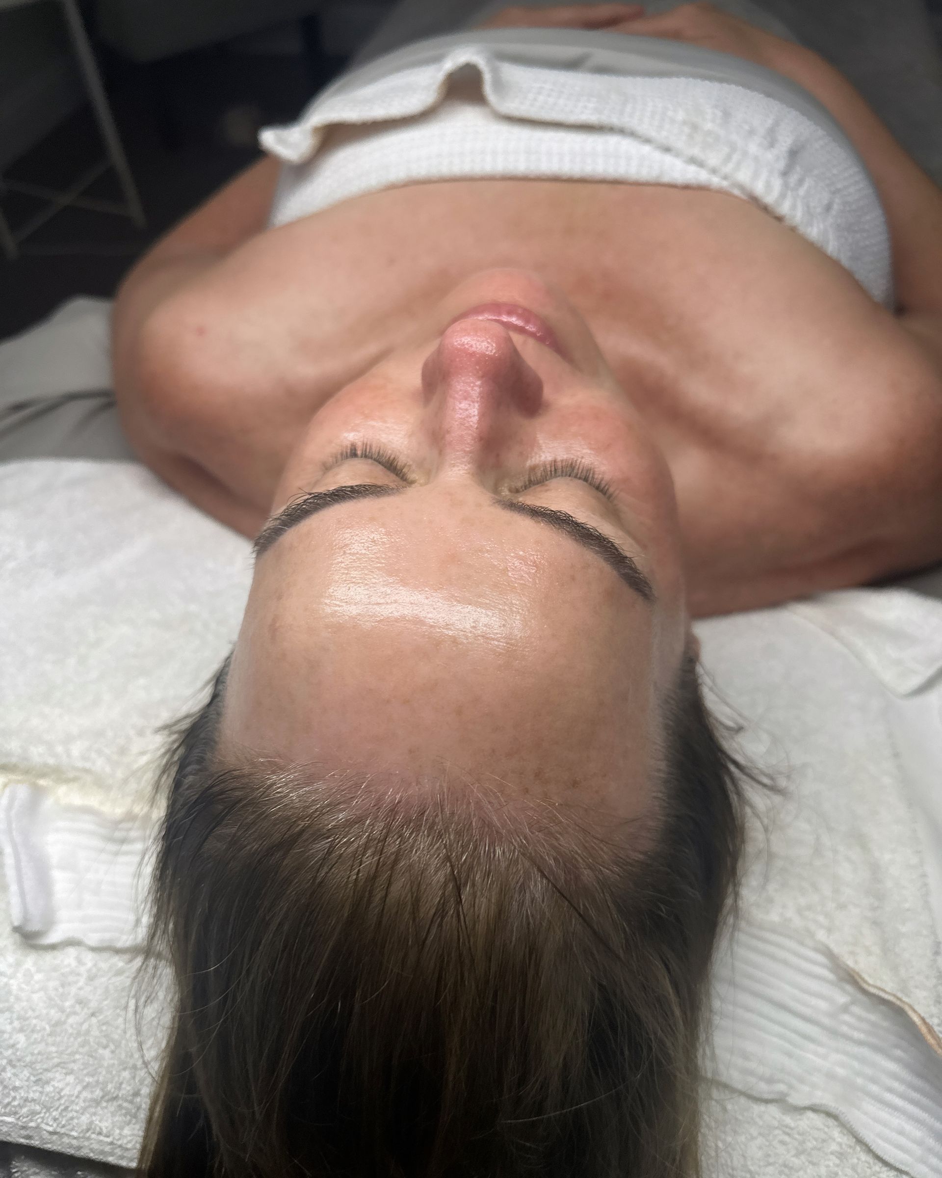 Woman getting a facial treatment