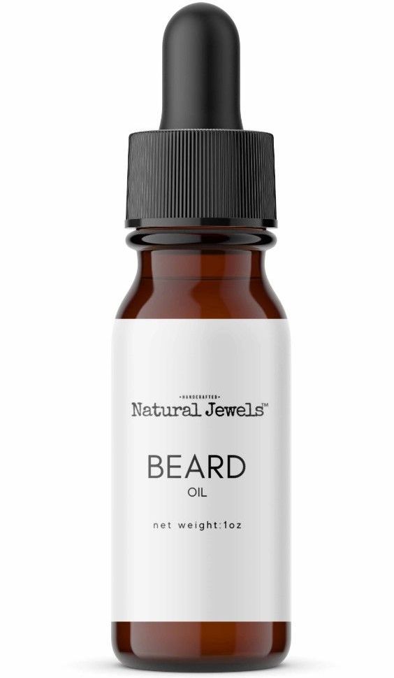 a bottle of beard oil with a dropper on a white background .