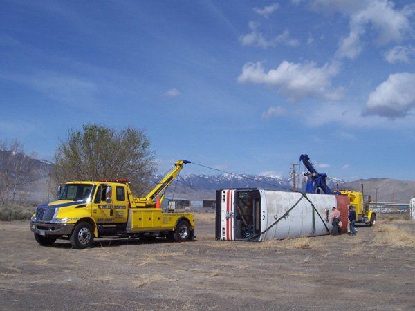 Heavy Duty Towing — Tow Trucking Towing a Bus in Reno, NV