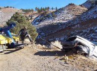 Flat Tire — Tow Truck Pulling Vehicle on Cliff in Reno, NV