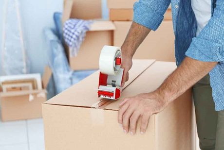 Worker Packing Tape — Pottsville Self Storage in Pottsville, NSW