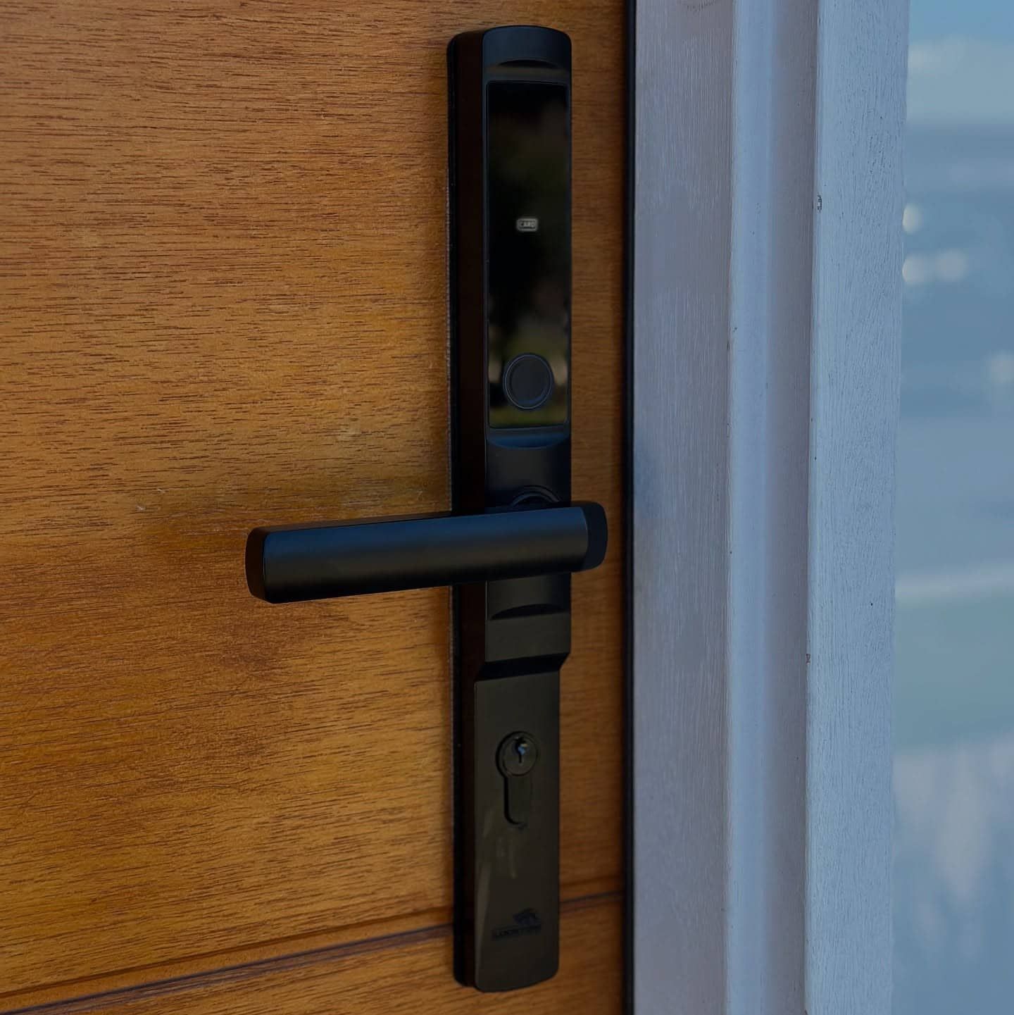 Black Door Handle on a Wooden Door, With Keyhole and Handle — Great Ocean Locksmiths in Aireys Inlet, VIC