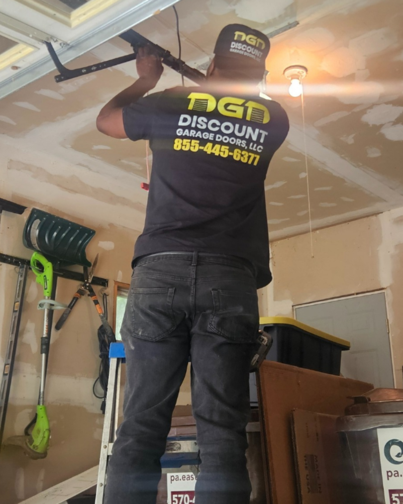 garage door tech doing a garage door opener in mountain top pa