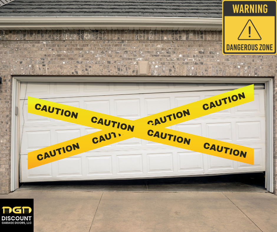 damaged garage door in dallas pa with emergency tape saying caution