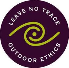 The official Leave No Trace logo is purple with a green swirl in the middle of it.