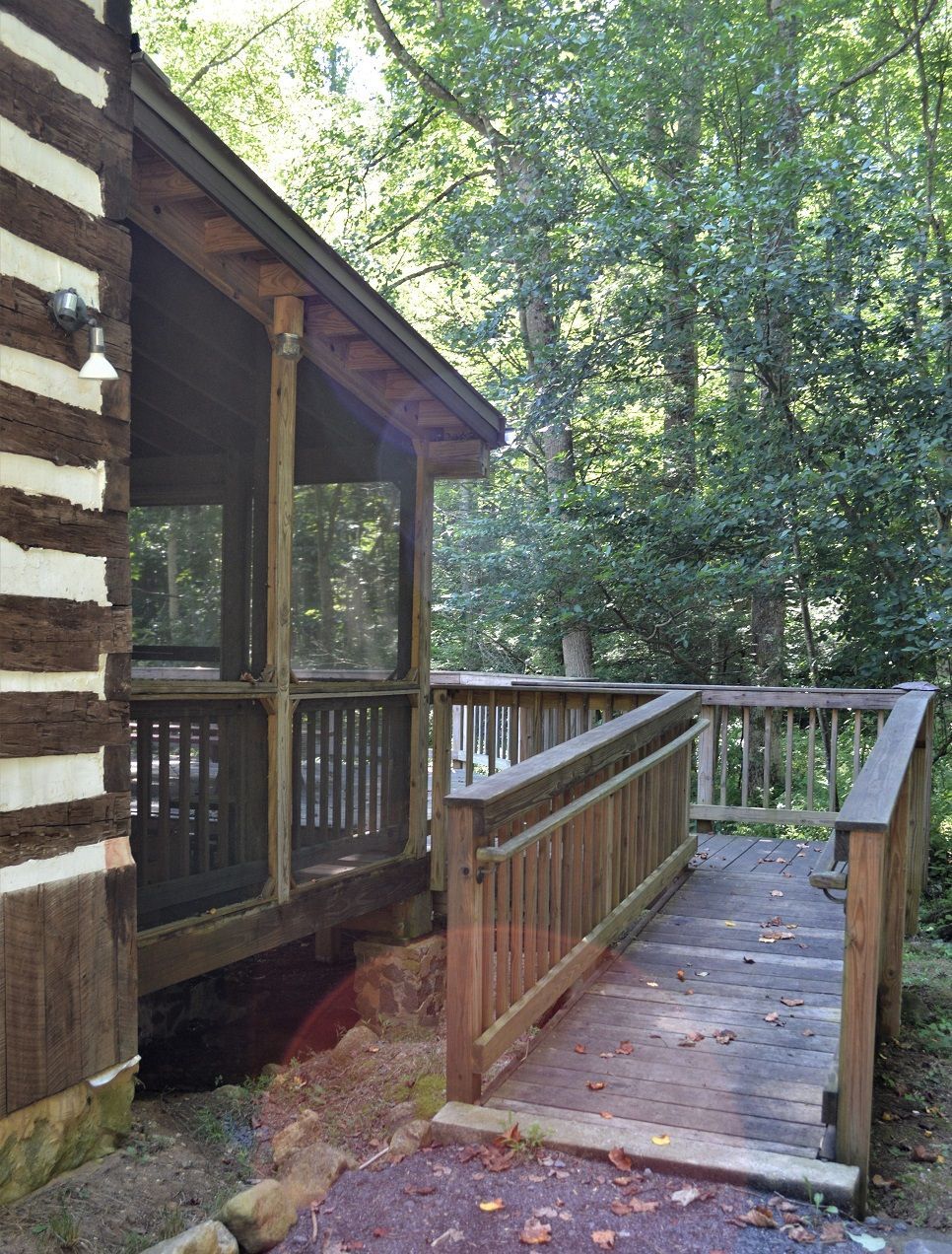 A view of the wooden porch at the Old Rag cabin.